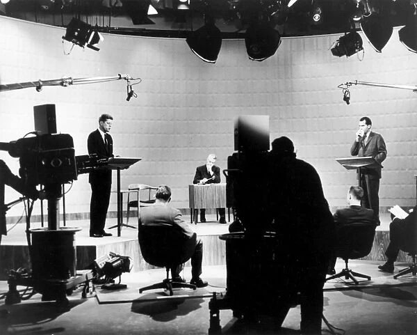 KENNEDY  /  NIXON DEBATE, 1960. John F. Kennedy, 35th President of the United States, debating Richard M. Nixon on television during the 1960 Presidential Campaign, moderated by Howard K. Smith