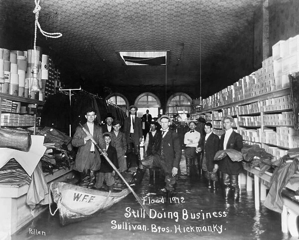 KENTUCKY: FLOOD, 1912. People inside the Sullivan Brothers store in Hickman, Kentucky
