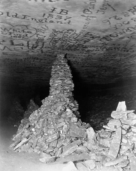 KENTUCKY: MAMMOTH CAVE. Cairns and graffiti left by tourists inside Mammoth Cave in Kentucky
