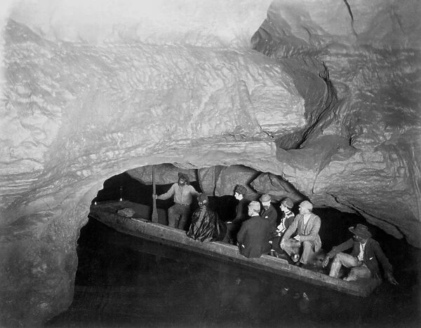 KENTUCKY: MAMMOTH CAVE. A group of visitors sitting afloat on Echo River, inside