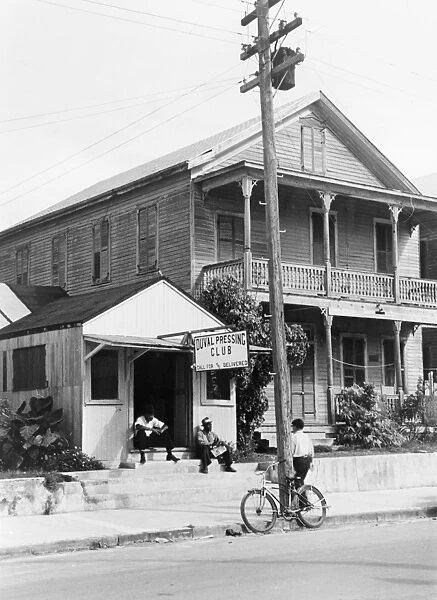 KEY WEST: DUVAL STREET, 1938. Duval Street in Key West, Florida. Photograph by Arthur Rothstein