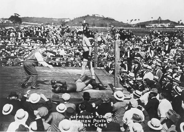 knocking out Jack Johnson in the 26th round of their Heavyweight Championship bout in Havana, Cuba, on April 5, 1915