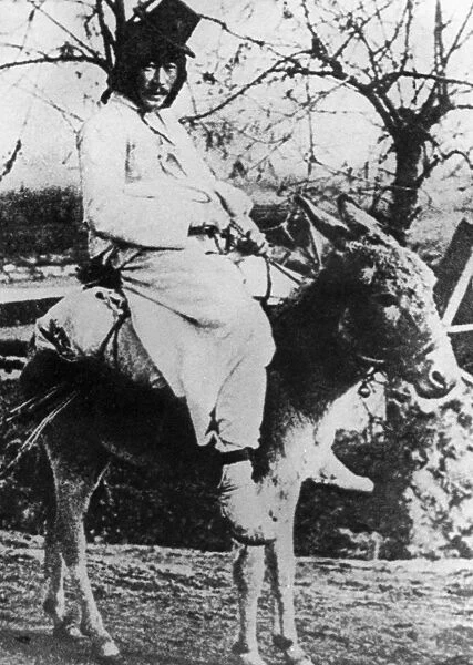 KOREA: TRAVELER, 1920s. Korean riding his donkey, 1920s