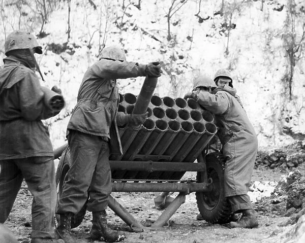 KOREAN WAR: ROCKET. A U. S. Marine Corps 24-rail T66 rocket launcher being loaded on the Korean front, early 1950s