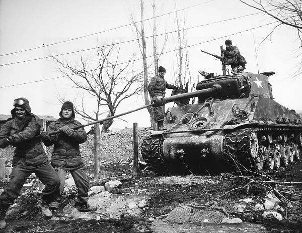 KOREAN WAR: TANK, 1951. The crew of an Allied tank uses a lull in fighting near the Korean central front north of Wonju, to clean weapons, 15 February 1951