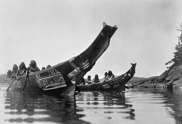 KWAKIUTL CANOES, c1914. Kwakiutl tribe of Native Americans in canoes on a river in British Columbia. Photograph by Edward S. Curtis, c1914