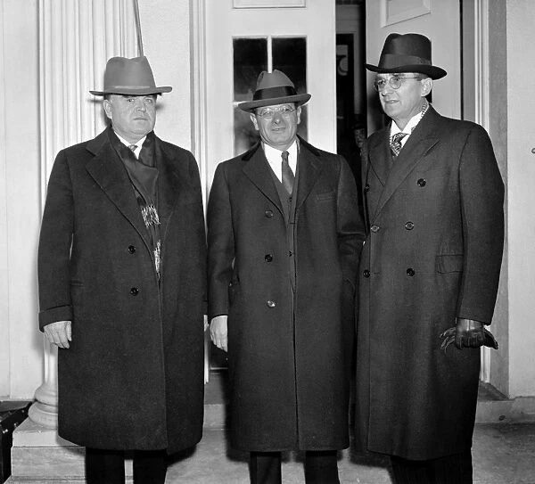 LABOR LEADERS, 1937. American labor leader John L. Lewis (left) with his two aides