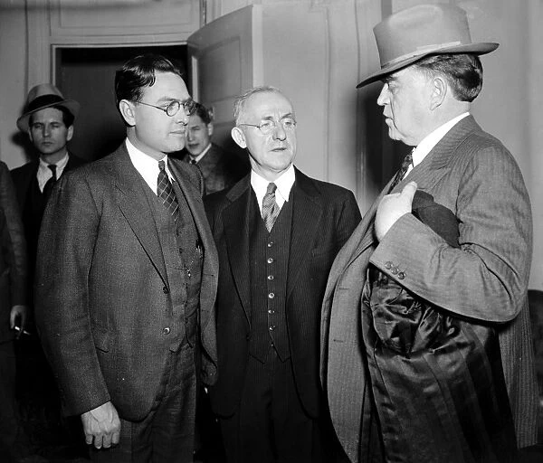LABOR LEADERS, 1937. Left to right: Homer Martin, President of the United Automobile
