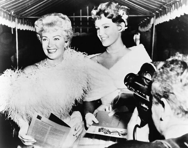 LANA TURNER (1921-1995). American actress. With her daughter Cheryl Crane (right)