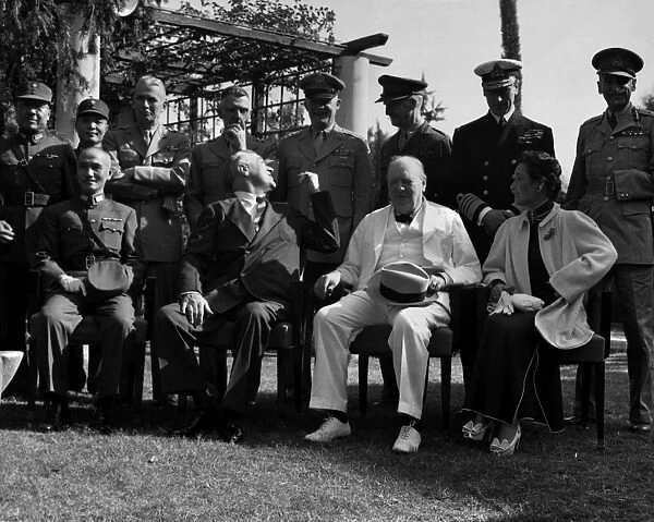 Leaders at the Cairo Conference, Egypt, which addressed the Allied position toward Japan during World War II. Front row, from left: Chiang Kai-Shek, Franklin Delano Roosevelt, Winston Churchill, and Madame Chiang Kai-Shek. Photographed on 25 November 1943