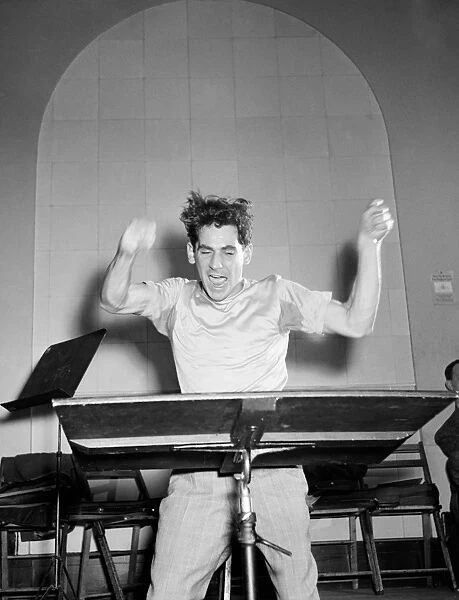 LEONARD BERNSTEIN (1918-1990). American composer and conductor. At Carnegie Hall in New York City