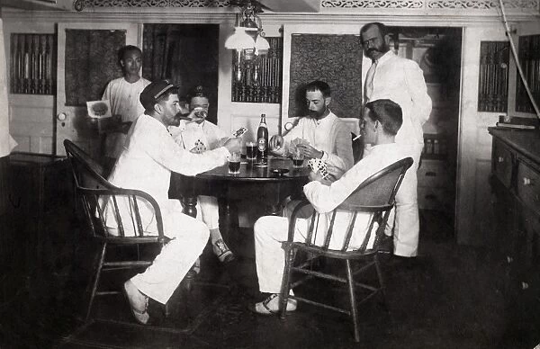 LIFE ON NAVAL SHIP, c1885. Officers relaxing below deck onboard the USS Mohican