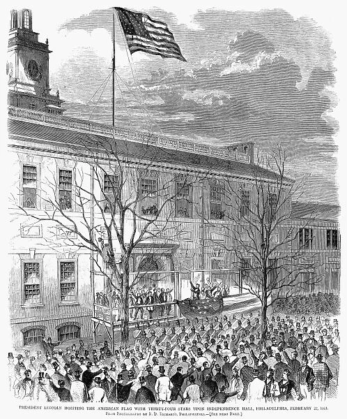 LINCOLN: INDEPENDENCE HALL. On his inaugural journey to Washington, D. C. Abraham Lincoln speaks at Independence Hall in Philadephia, Pennsylvania, on 22 February 1861 and raises the 35-star American flag. Wood engraving from a contemporary American newspaper