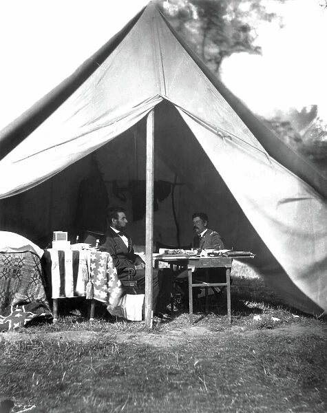 LINCOLN & McCLELLAN. Abraham Lincoln (1809-1865), 16th President of the United States, and General George B. McClellan on the battlefield in Antietam, Maryland. Photograph by Alexander Gardner, probably 3 October 1862