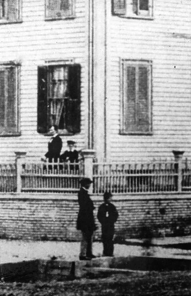 LINCOLN AND SONS, 1860. Abraham Lincoln with his sons Willie and Tad at their home in Springfield