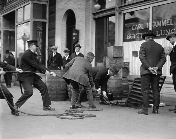 LIQUOR RAID, 1923. Prohibition officers raiding Carl Hammels restaurant in Washington, D