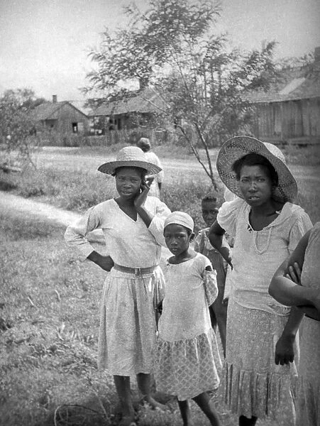 LOUISIANA: ALMA PLANTATION. African American girls and women at the Alma Plantation