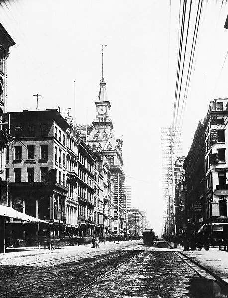 LOWER BROADWAY, c1890. View of Broadway, New York City, looking north from Cortlandt Street, with the turreted Western Union Telegraph Company building at left: photographed c1890
