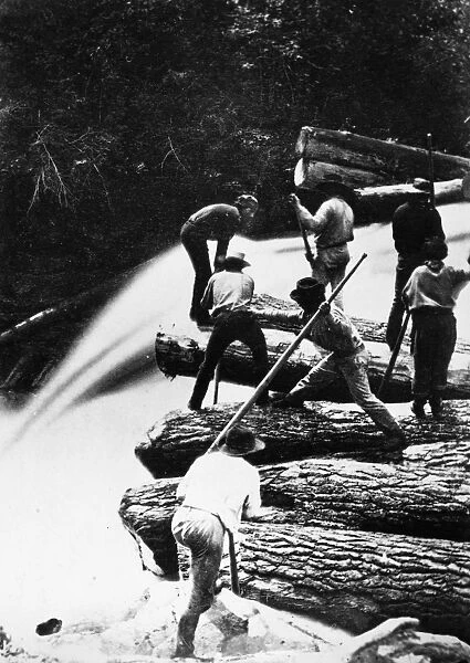 LUMBERING: LOG JAM, c1865. Lumberjacks breaking a log jam on a river
