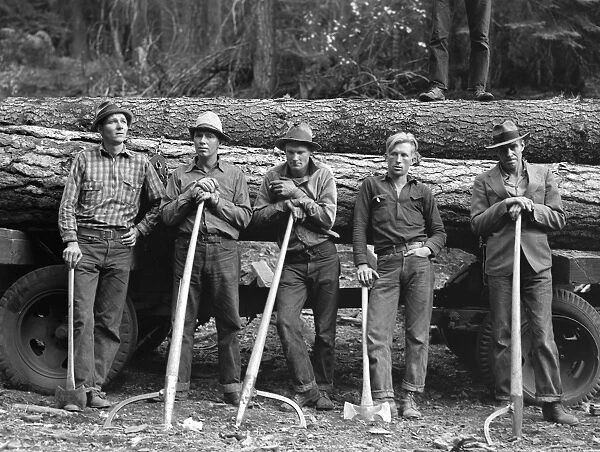 LUMBERJACKS, 1939. Five lumberjacks of the Ola self-help sawmill cooperative, Gem County, Idaho