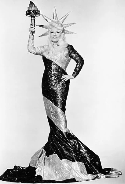 MAE WEST (1892-1980). American actress. West in a still from the film Myra Breckenridge, 1970