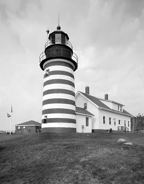 MAINE: LIGHTHOUSE. The West Quoddy Head Light Station and lighthouse keepers house in Lubec