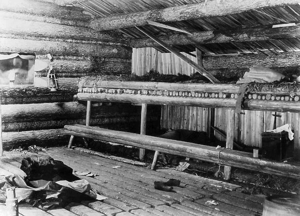 MAINE: LOG CABIN, 1889. Interior of loggers camp on Mud Pond in which 39 nights