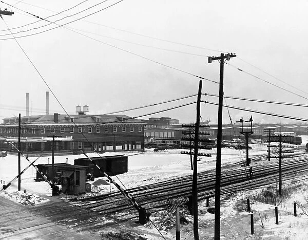 MANVILLE IRON WORKS, 1936. View of the Manville Iron Works and railroad, Manville, New Jersey