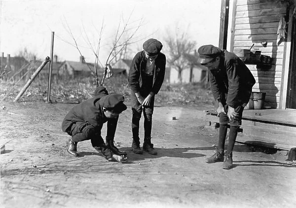 MARBLES GAME, 1908. Young boys playing a game of marbles, in Salisbury, North Carolina
