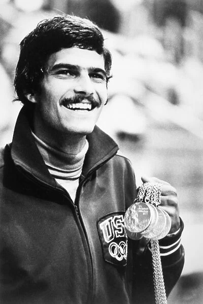 MARK SPITZ (1950- ). American swimmer. Photographed with five gold medals he won during the 1972 Summer Olympics in Munich, Germany