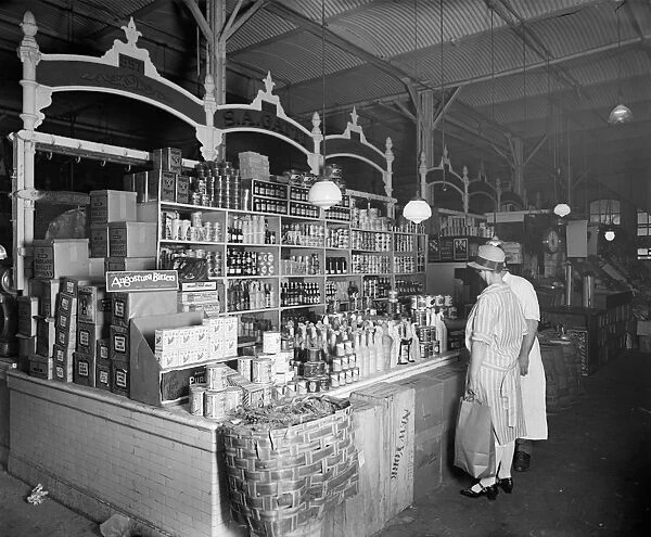 MARKET, c1916. S. A. Gatte dry goods stand. Photograph, c1916