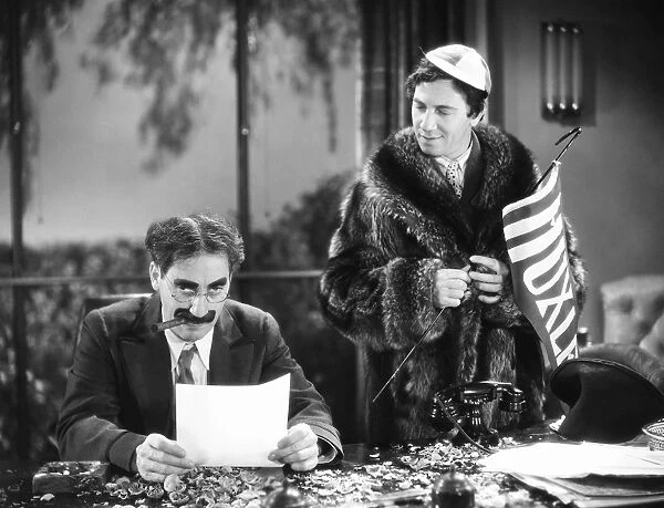THE MARX BROTHERS, 1932. Groucho (left) and Chico Marx in Horse Feathers, 1932