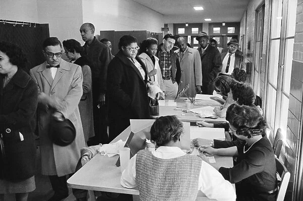 MARYLAND: VOTING, 1962. Voters on Election Day in Maryland. Photograph by Warren K