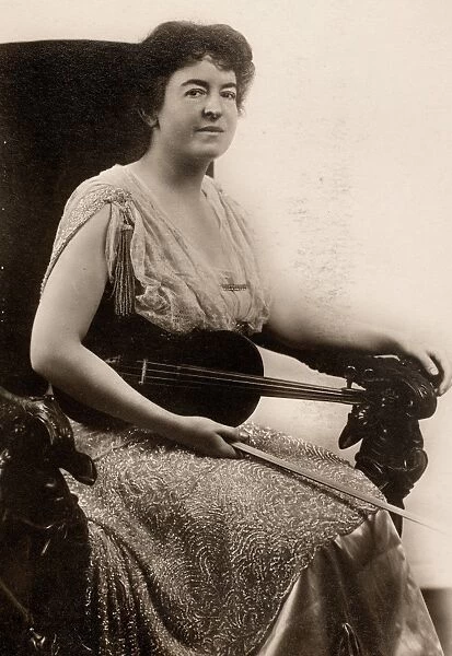 MAUD POWELL (1868-1920). American violinist. Photographed in October 1915