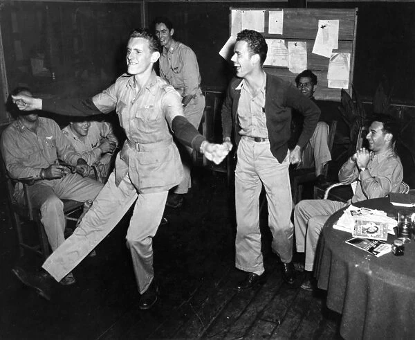 Members of a U. S. Air Force Squadron dancing while stationed in India during World War II. Photograph, April 1943