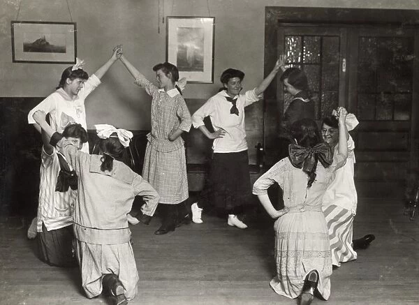 Members of the Womens Union in Fall River, Massachusetts, folk dancing together. Photograph by Lewis Hine, 1916