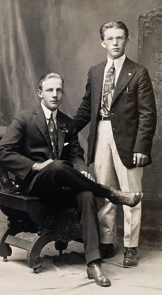 MENs FASHION, 1917. American studio portrait of two brothers, 1917