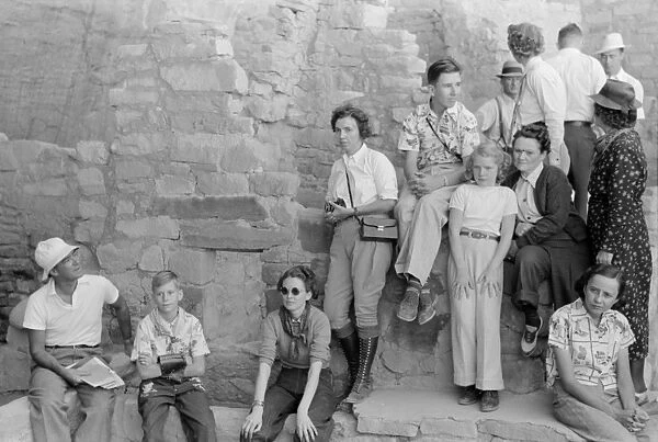 MESA VERDE: TOURISM, 1939. Tourists at cliff dwellings in Mesa Verde National Park, Colorado