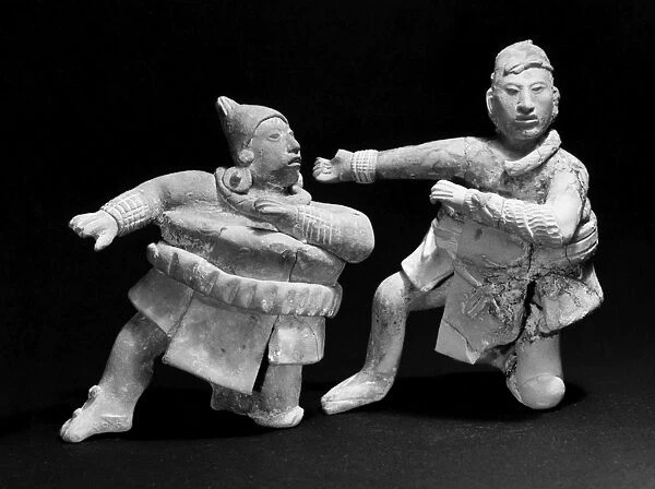 MEXICO: MAYAN BALL PLAYERS. Two ceramic figures of fMexican ball players wearing thick protective clothing. From Jaina Island, Campeche, Mexico, 200-900 A. D
