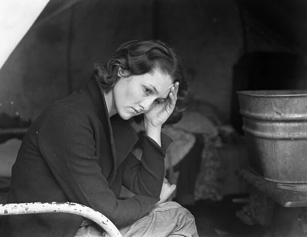 MIGRANT CAMP, 1936. The daughter of a migrant Tennessee coal miner living in the