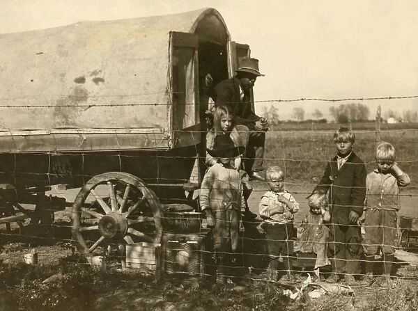 MIGRANT FAMILY, 1915. The prairie-wagon home of a family of itinerant beet workers