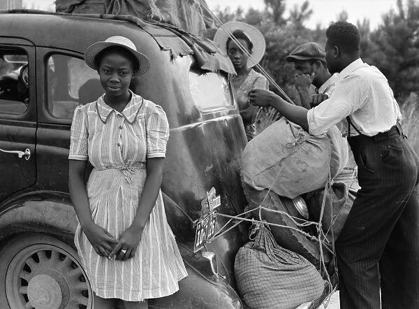 MIGRANT FARMERS, 1940. Group of migrants from Florida on their way to Cranberry