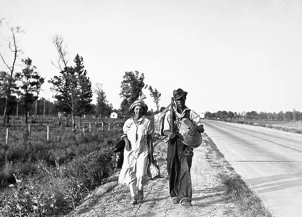 MIGRANT WORKERS, 1936. Migrant workers on the road in Crittenden County, Arkansas