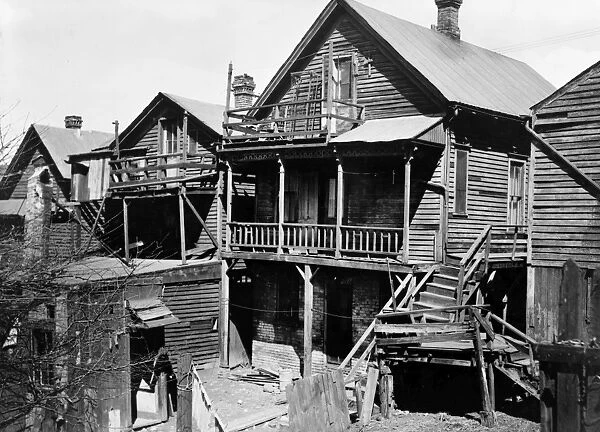 MILWAUKEE SLUM, 1936. Dilapidated homes in the slum section of Milwaukee, Wisconsin