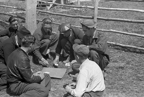 MINER STRIKE, 1939. Miners playing cards during a coal strike in Kempton, West Virginia