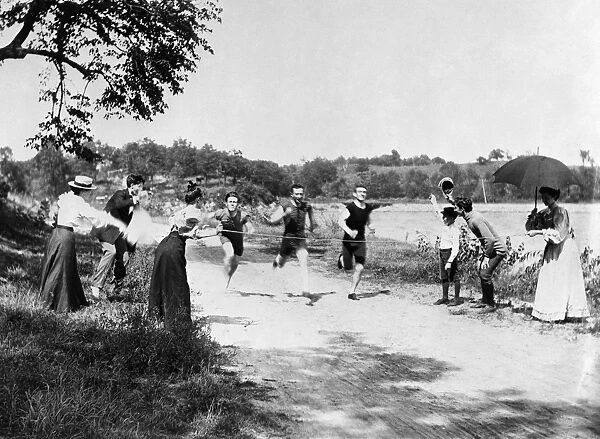 MINNESOTA: FOOT RACE. Foot race along a country road in Minnesota. Photograph, c1900