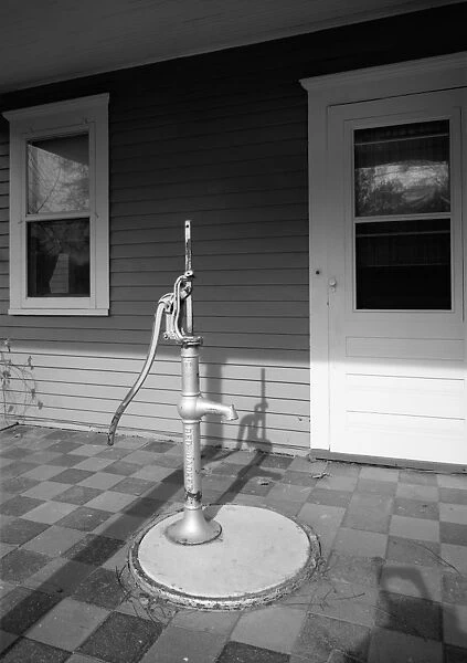 MINNESOTA: HAND PUMP. Hand pump on the porch of the Andrew John Volstead House in Granite Falls
