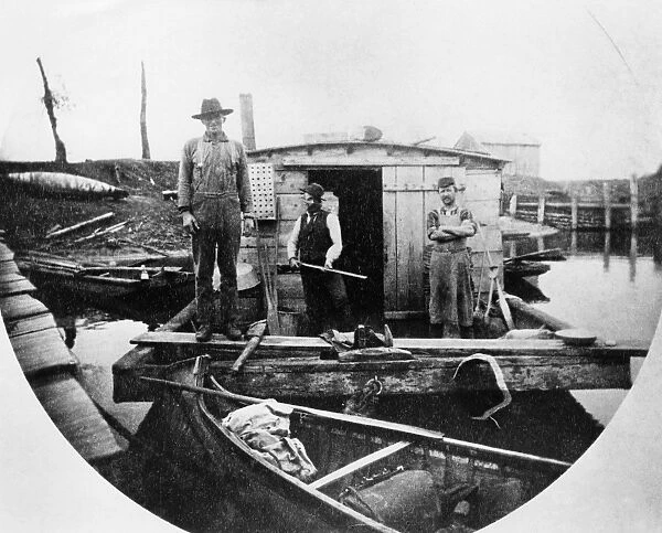 MINNESOTA: WANIGAN, c1890. Three men on a wanigan on a river. Photograph, c1890