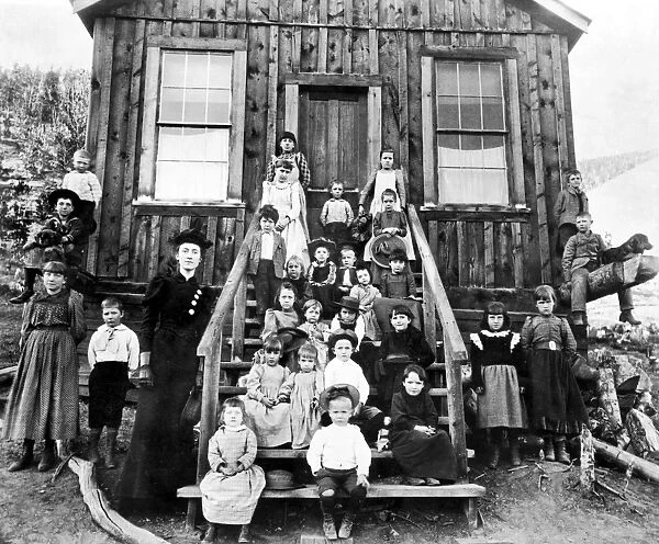 Miss Blanche Lamont with her school in Hecla, Montana, October 1893
