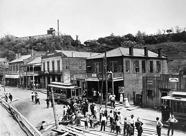 MISSISSIPPI: NATCHEZ, 1912. Crowds waiting at the riverboat landing in Natchez